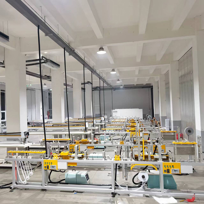 Macchina semiautomatica e CNC per la fabbricazione di chiusure da nido di miele